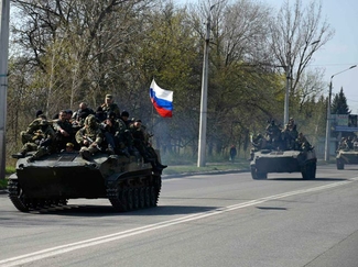 Депутат: Бронетехника под российскими флагами — спецоперация украинской армии